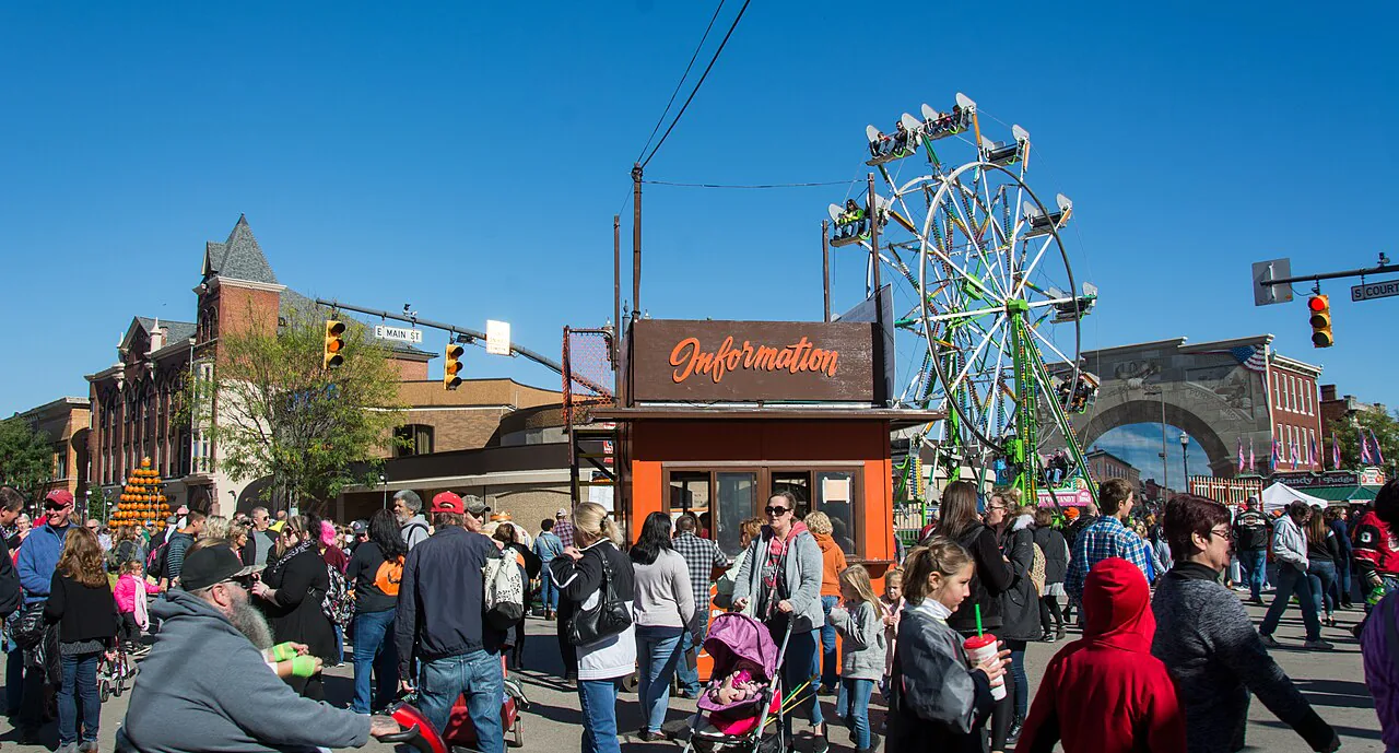 Festival crowd and Ferris wheel at the Circleville Pumpkin Show in Ohio