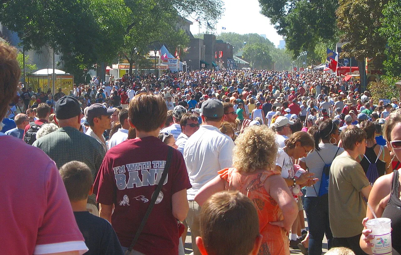Large afternoon crowd walking through the Minnesota State Fair