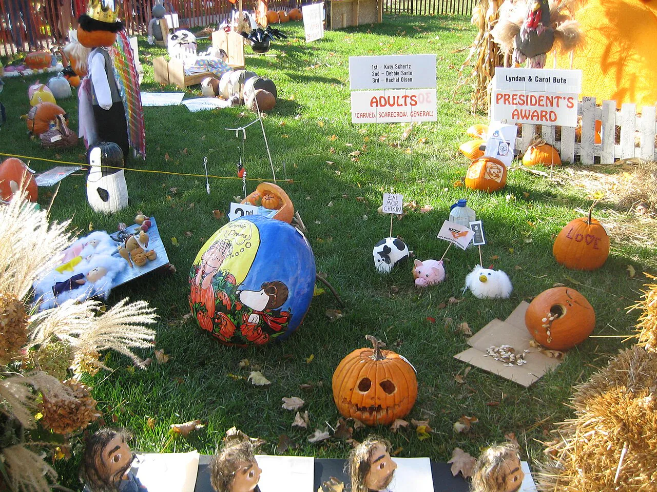 Decorated pumpkins displayed on the courthouse lawn at the Sycamore Pumpkin Festival in Illinois